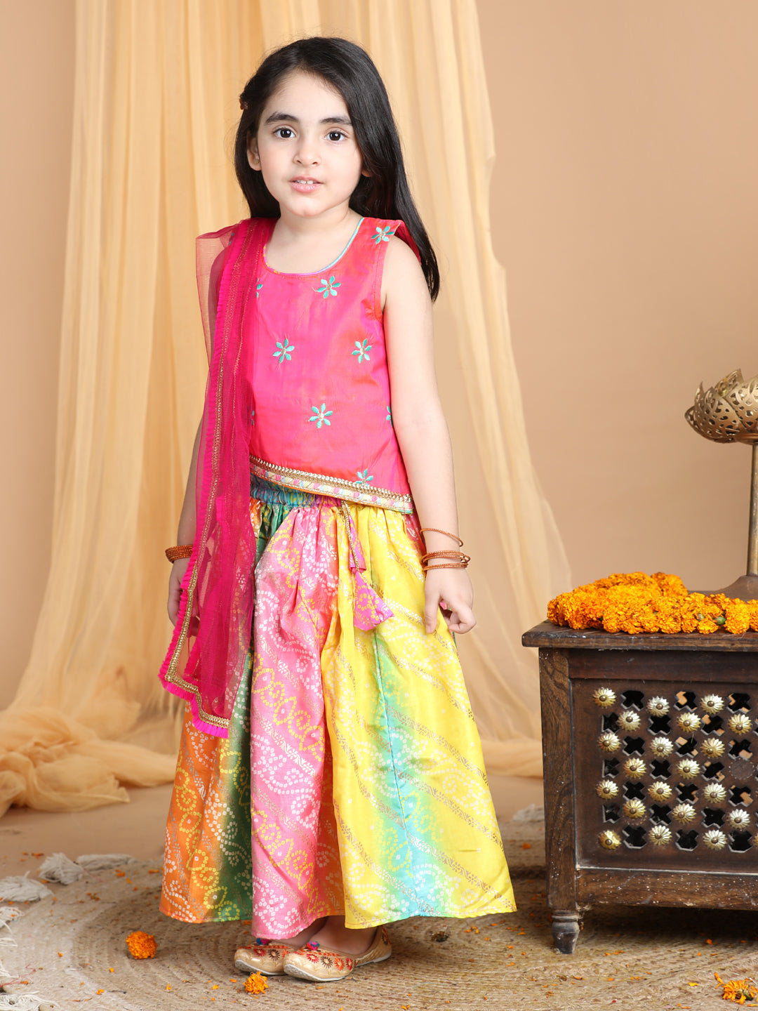 Pink Top with multi color gold printed lehenga and dupatta