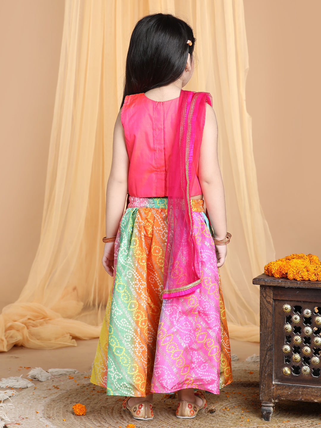 Pink Top with multi color gold printed lehenga and dupatta