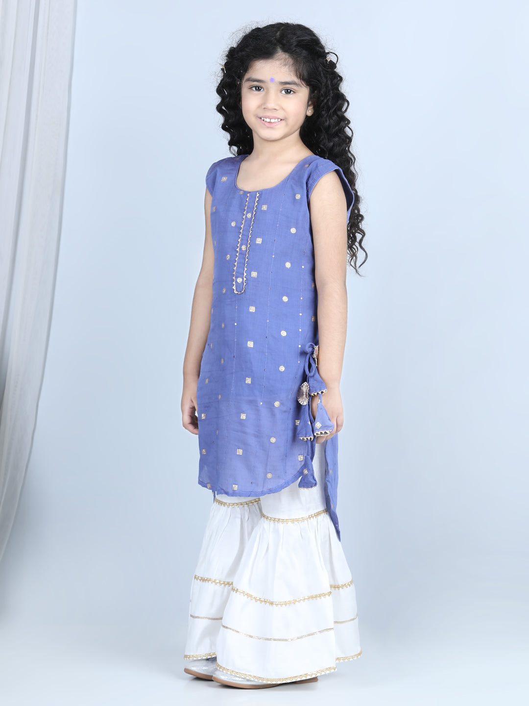 Blue Foil Printed Tassel Ornamentation Detail High Low Style Kurti With Sharara