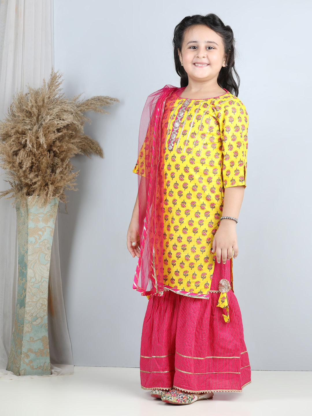Yellow Printed kurti with Pink sharara with dupatta