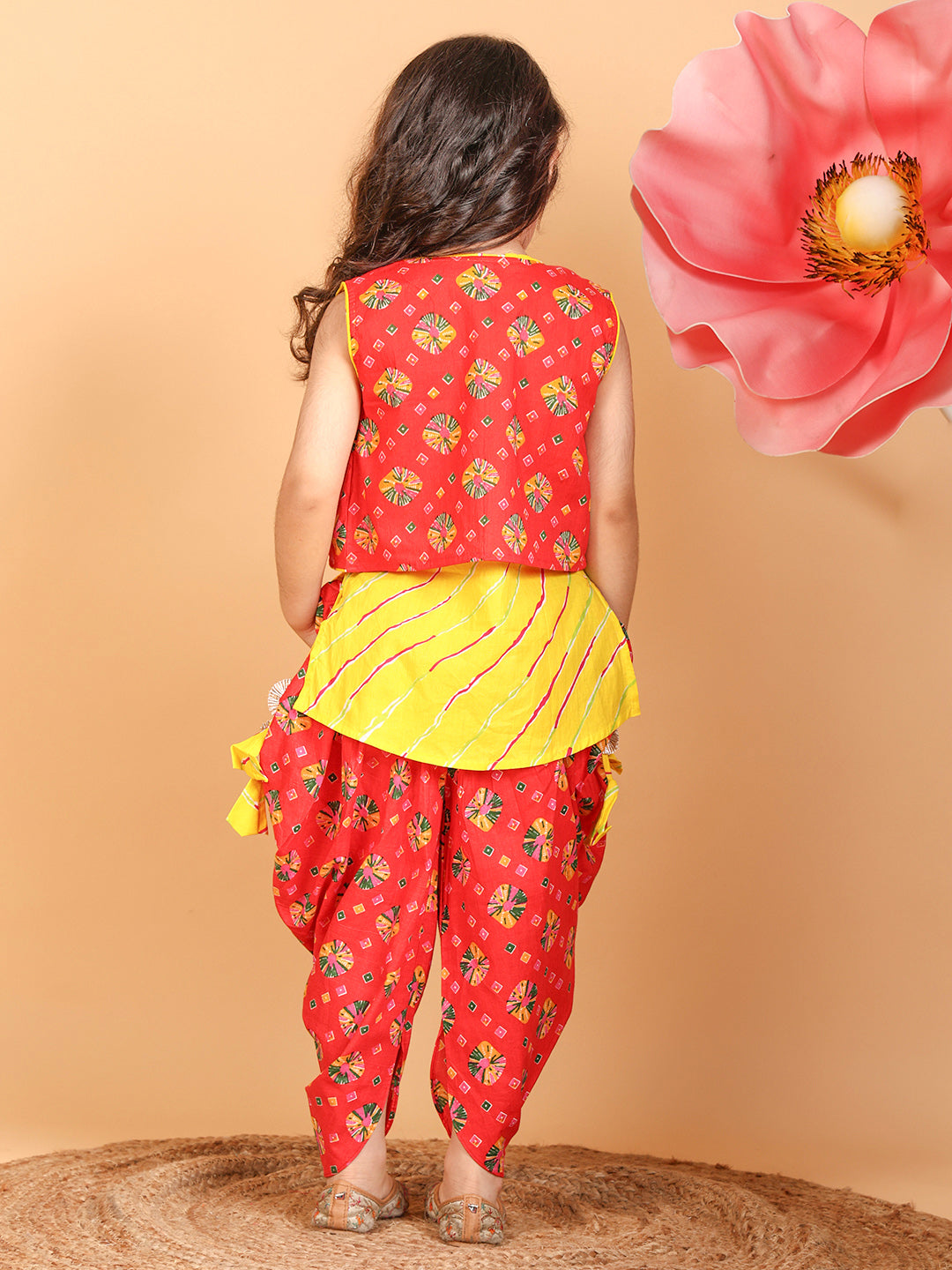 Yellow Lehriya Kurti with red printed dhoti and Jacket
