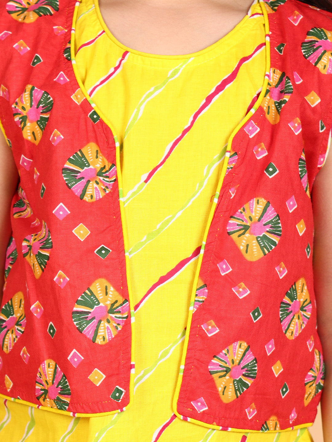 Yellow Lehriya Kurti with red printed dhoti and Jacket