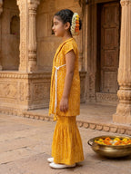 Yellow Bandhani printed half sleeves collared Kurti with white pant