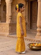 Yellow Bandhani printed half sleeves collared Kurti with white pant