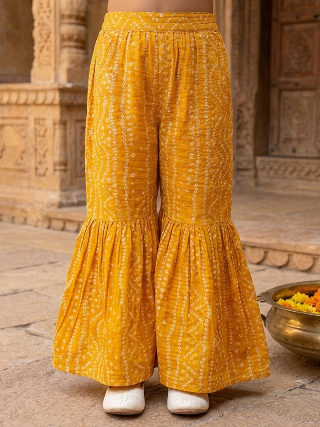 Yellow Bandhani printed half sleeves collared Kurti with white pant