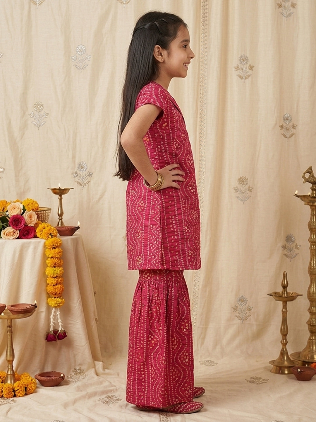 Pink Bandhani printed half sleeves collared Kurti with white pant