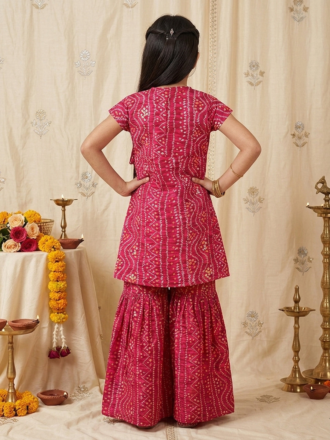Pink Bandhani printed half sleeves collared Kurti with white pant