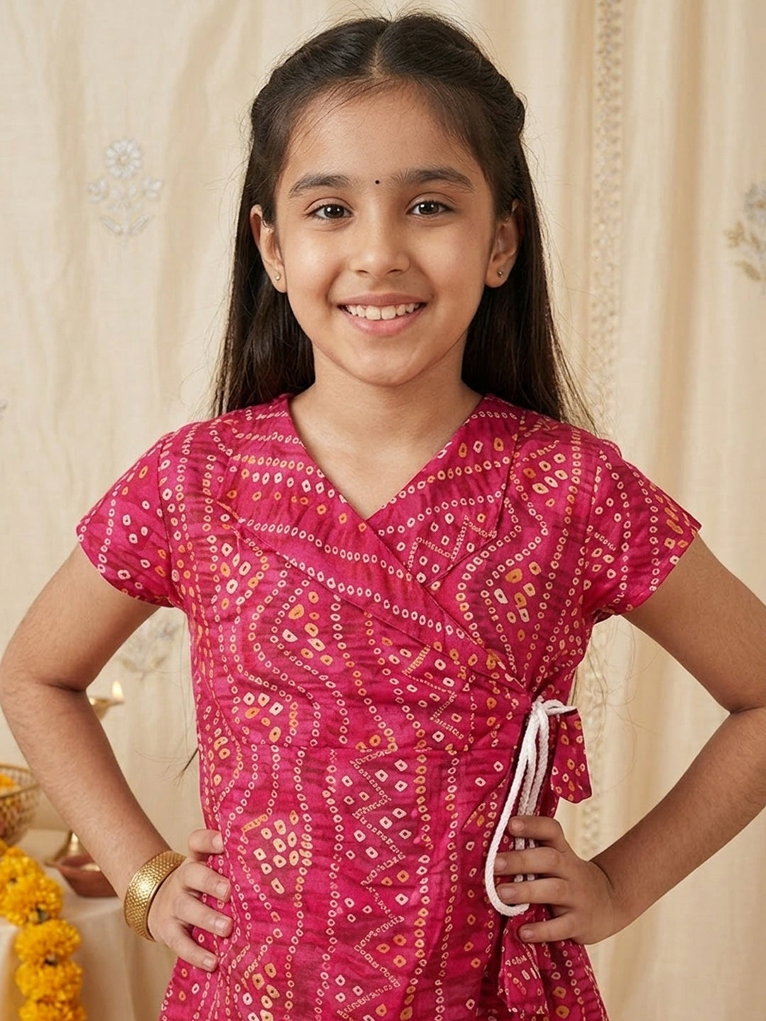 Pink Bandhani printed half sleeves collared Kurti with white pant