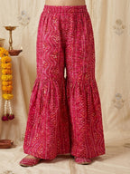 Pink Bandhani printed half sleeves collared Kurti with white pant