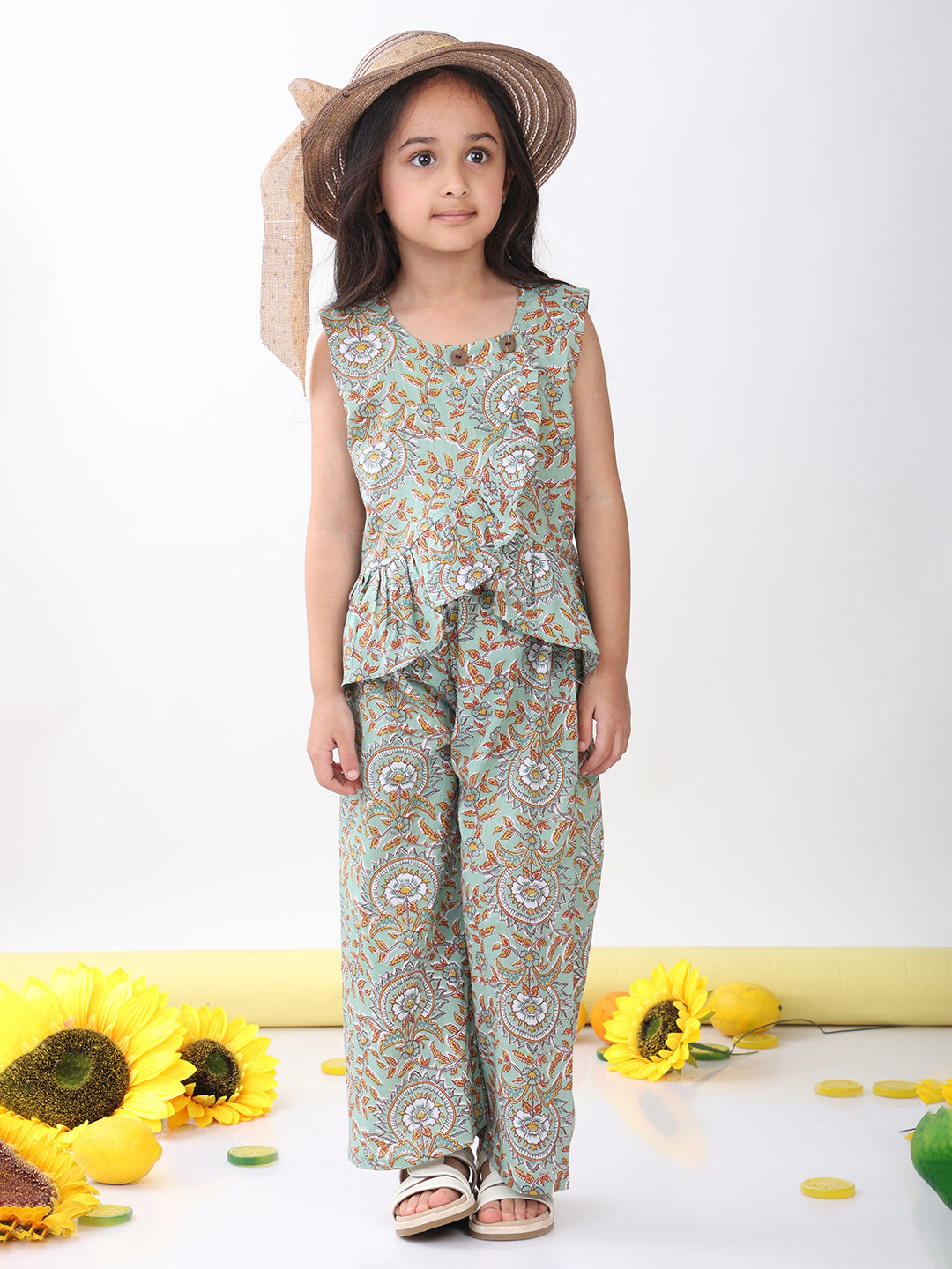 Green sleeveless floral jaal printed top and pant