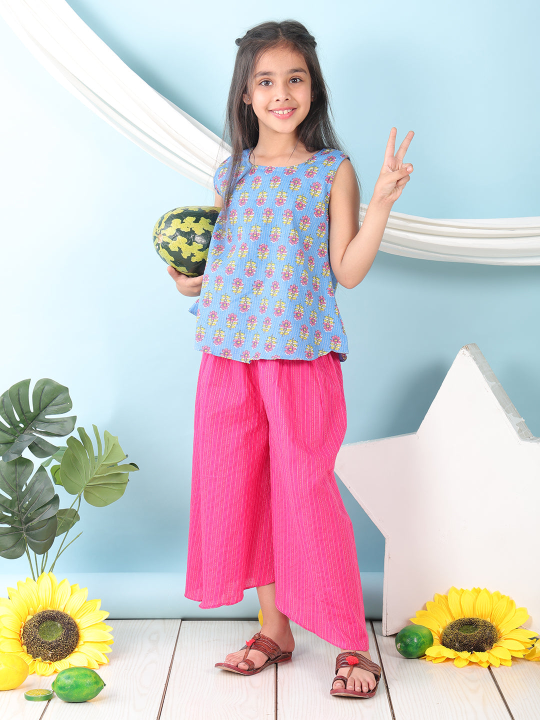 Blue  floral printed  sleeveless Short Kurti with Pink flair pant
