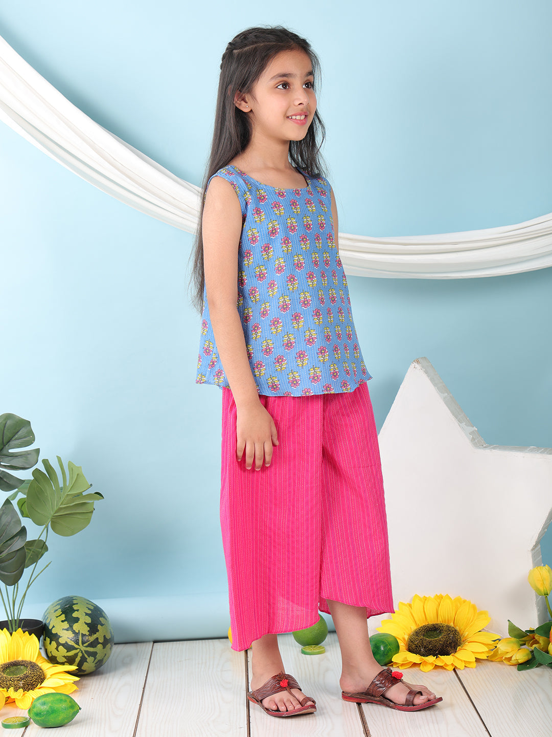 Blue  floral printed  sleeveless Short Kurti with Pink flair pant