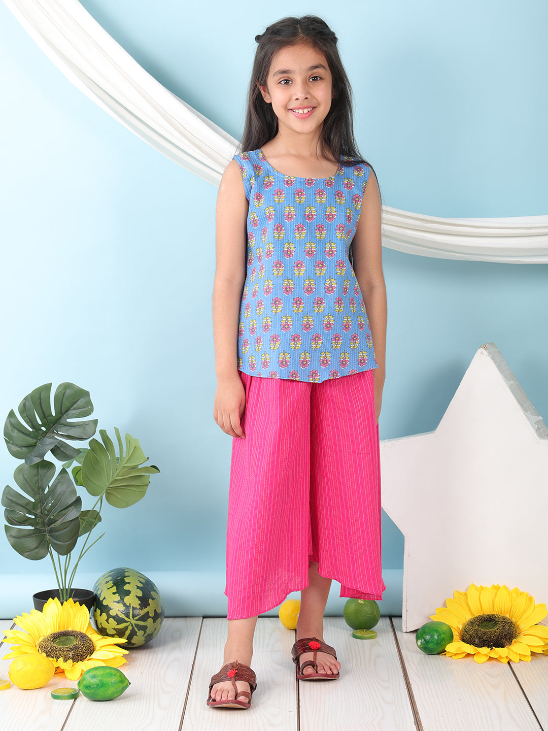 Blue  floral printed  sleeveless Short Kurti with Pink flair pant