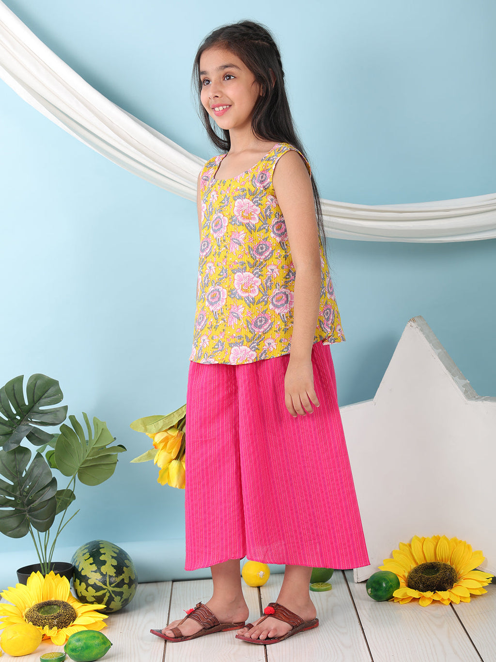 Yellow floral printed  sleeveless Short Kurti with Pink flair pant
