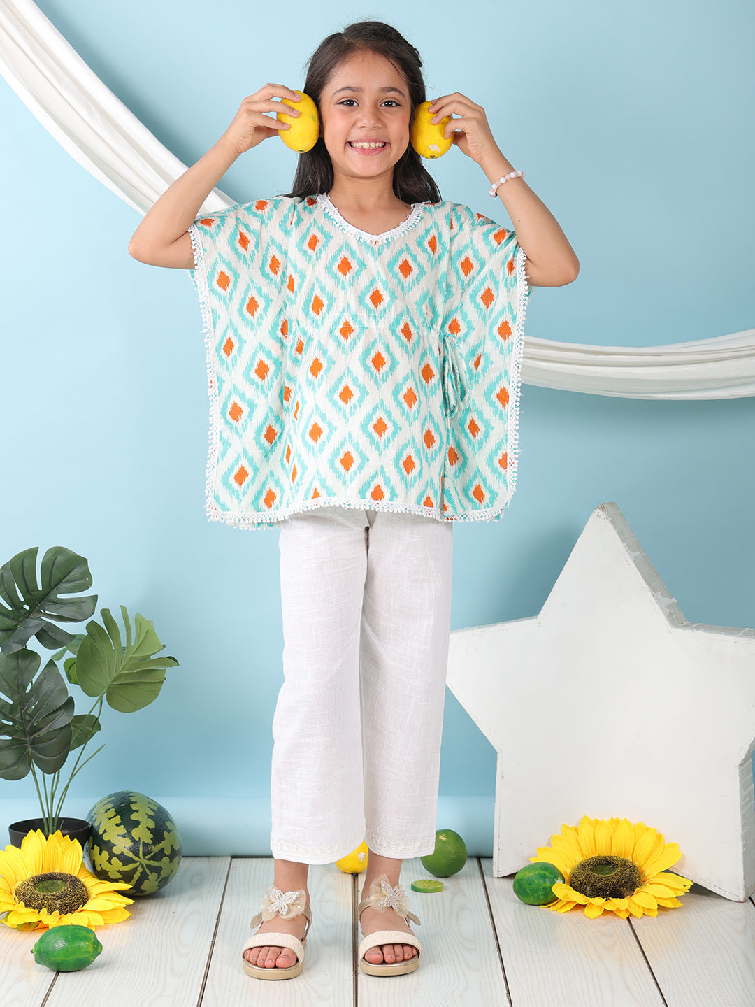 Blue checkered Printed Kaftan paired with white cotton pant