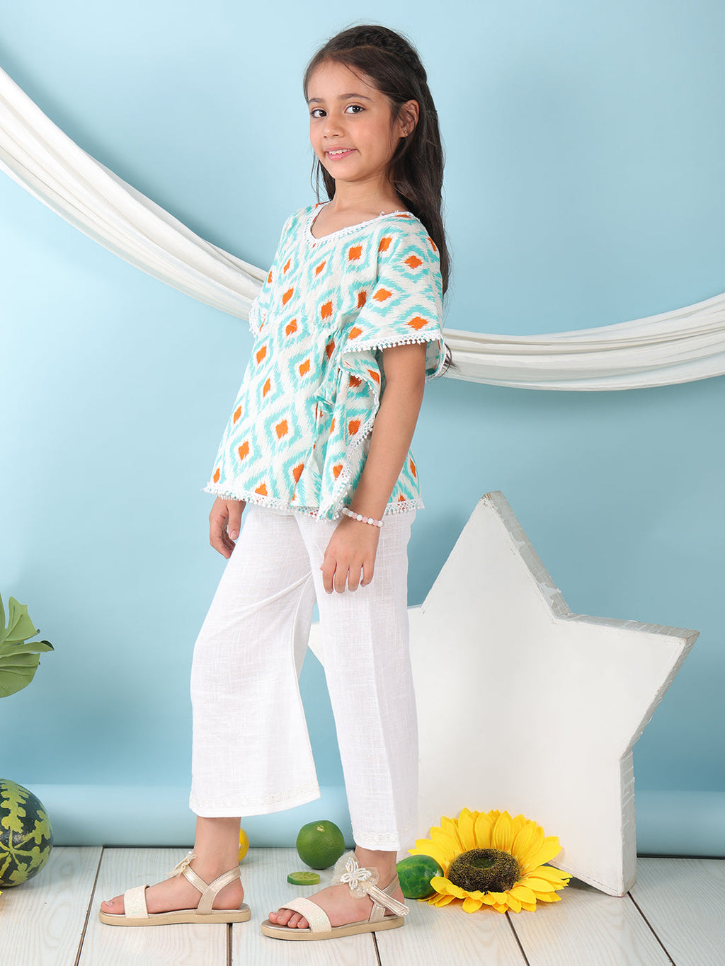 Blue checkered Printed Kaftan paired with white cotton pant