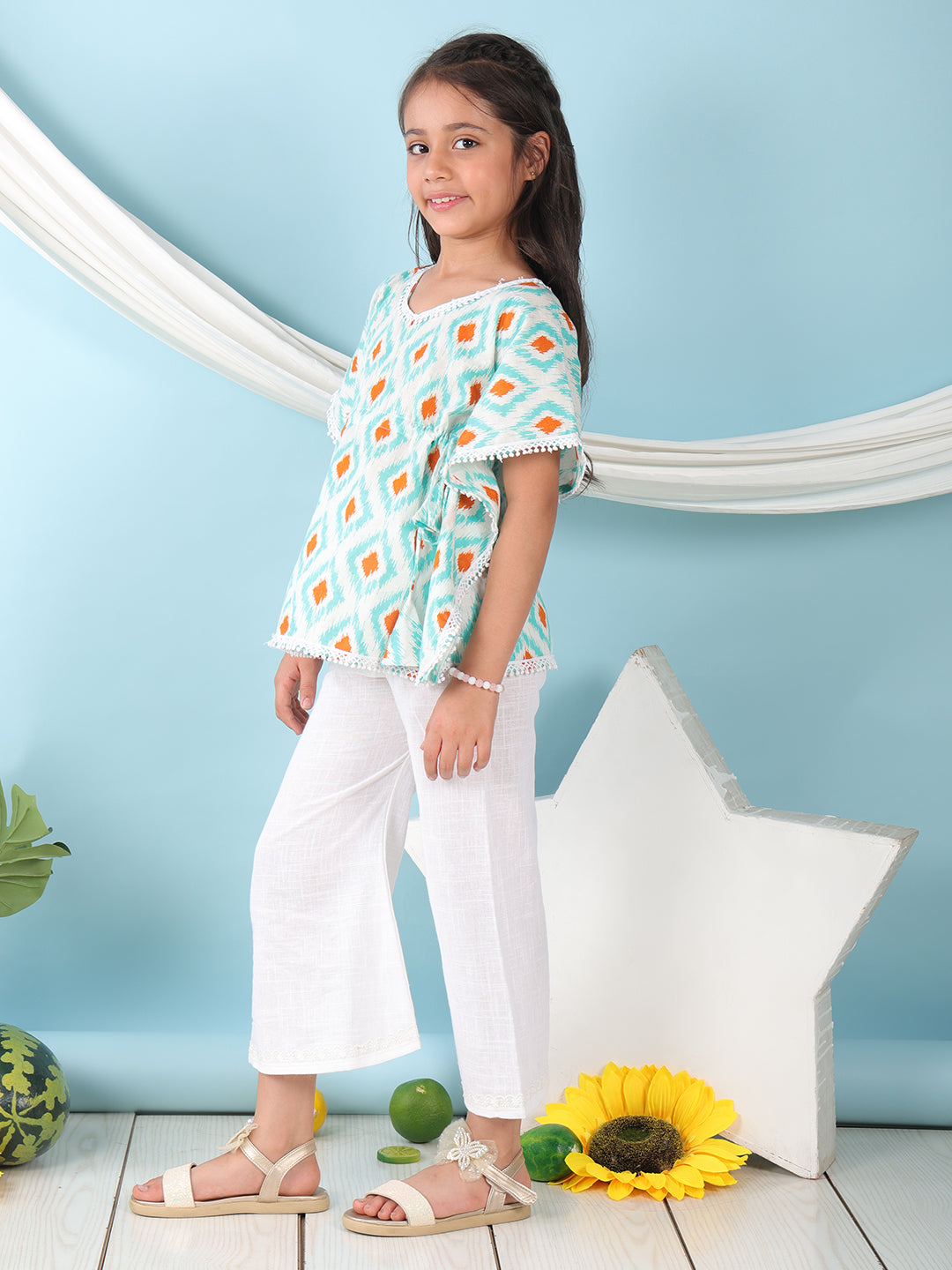 Blue checkered Printed Kaftan paired with white cotton pant