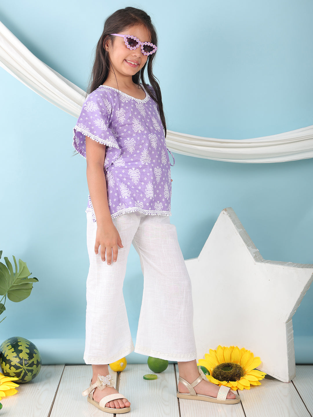 Purple Floral Printed Kaftan paired with white cotton pant