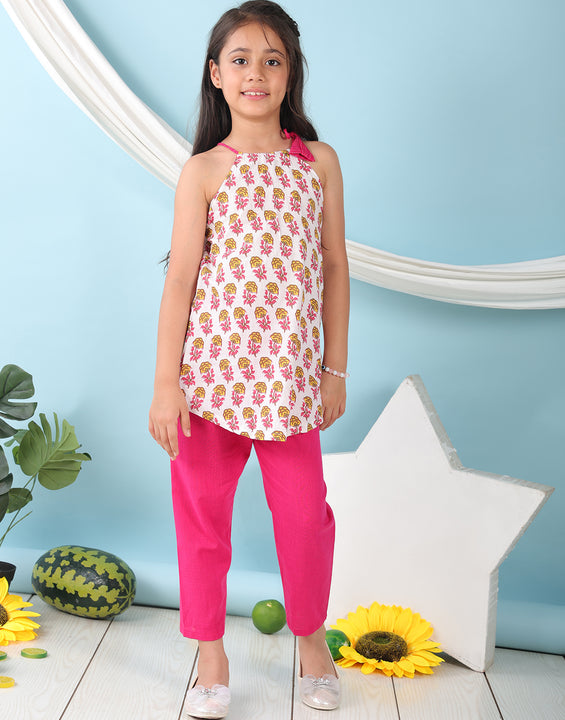 White floral sleeveless tie on Kurti with Pink Pant