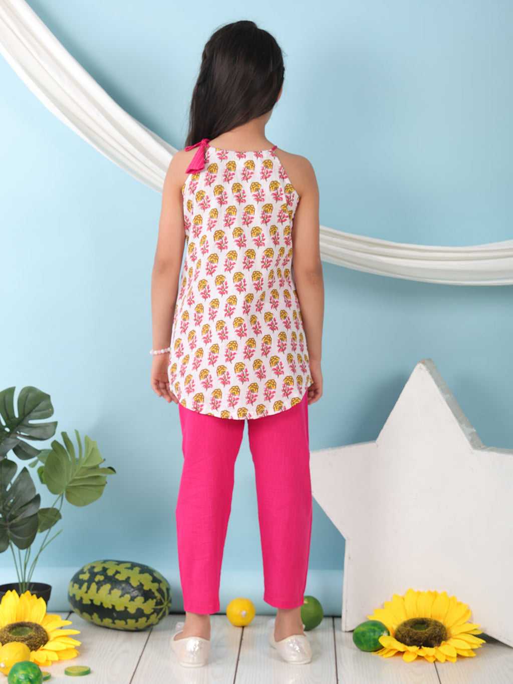 White floral sleeveless tie on Kurti with Pink Pant