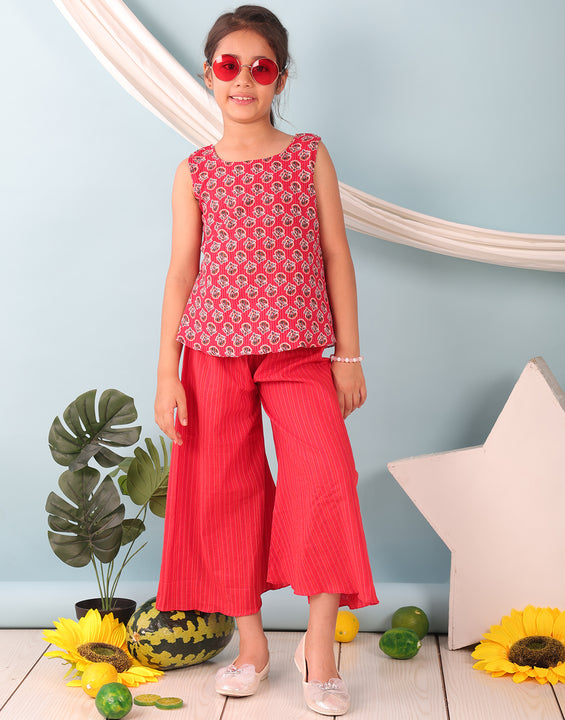 Red floral printed  sleeveless Short Kurti with Red flair pant
