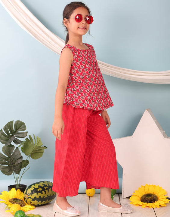 Red floral printed  sleeveless Short Kurti with Red flair pant