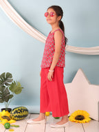Red floral printed  sleeveless Short Kurti with Red flair pant