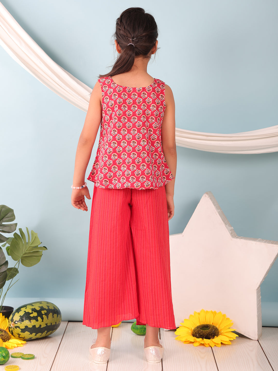 Red floral printed  sleeveless Short Kurti with Red flair pant