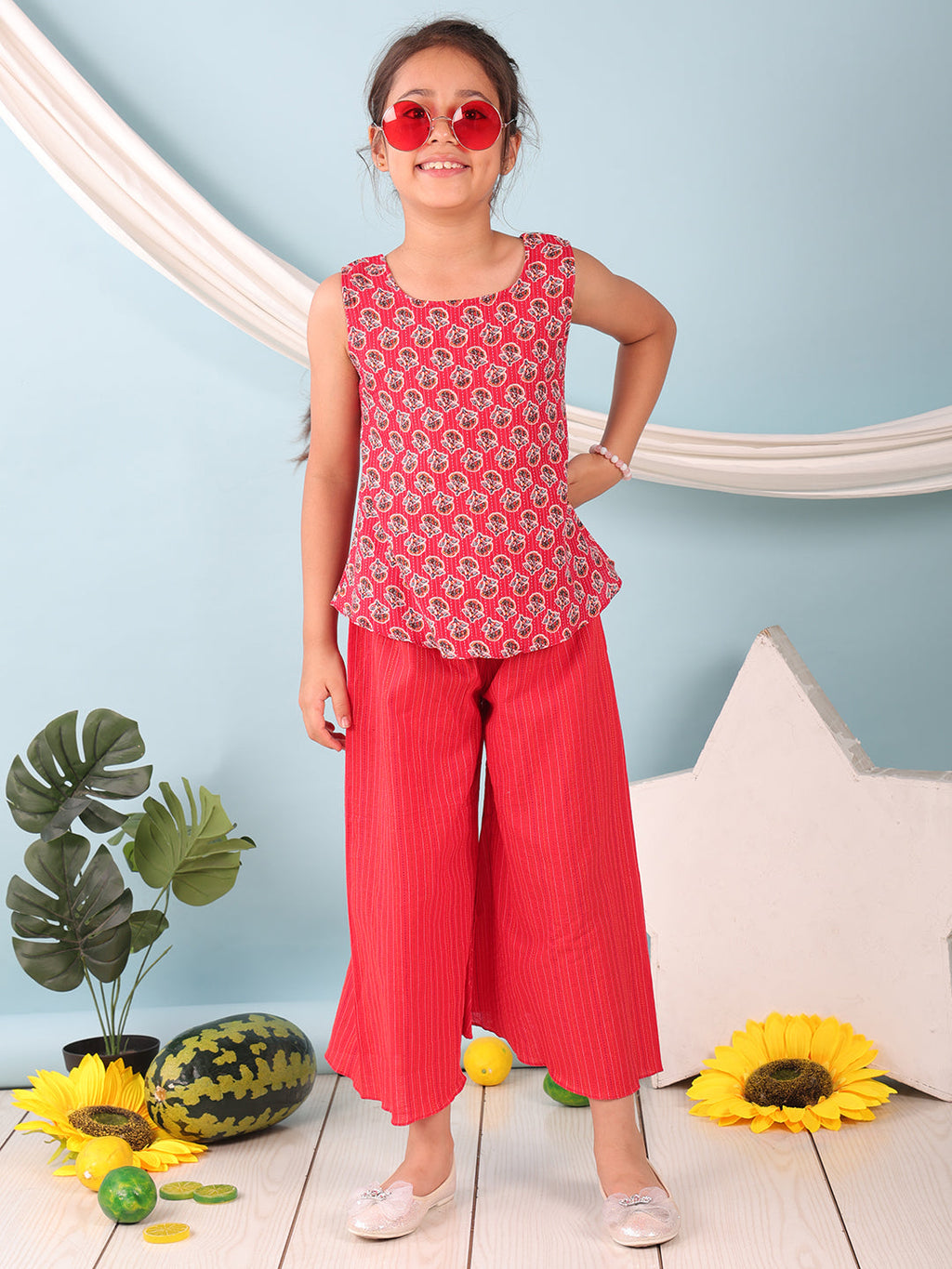 Red floral printed  sleeveless Short Kurti with Red flair pant