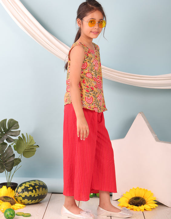 Green floral printed  sleeveless Short Kurti with Red flair pant