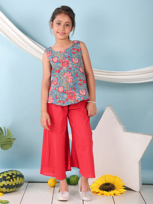 Blue floral printed  sleeveless Short Kurti with Red flair pant