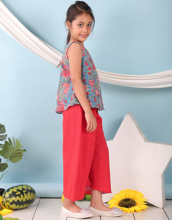 Blue floral printed  sleeveless Short Kurti with Red flair pant