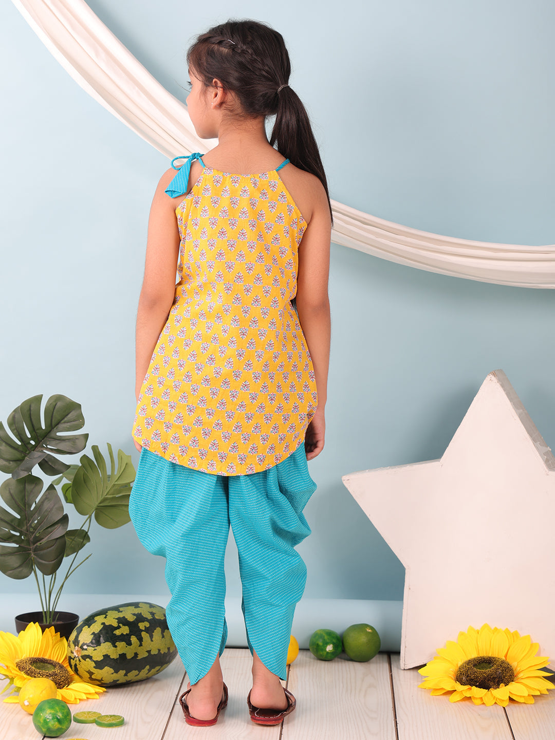 Yellow floral sleeveless tie on Kurti with Blue Dhoti