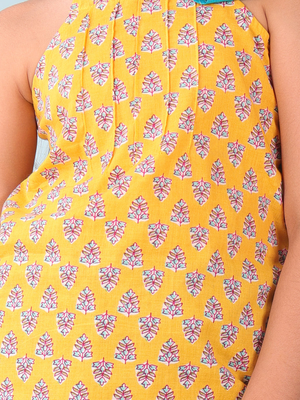 Yellow floral sleeveless tie on Kurti with Blue Dhoti