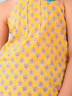 Yellow floral sleeveless tie on Kurti with Blue Dhoti