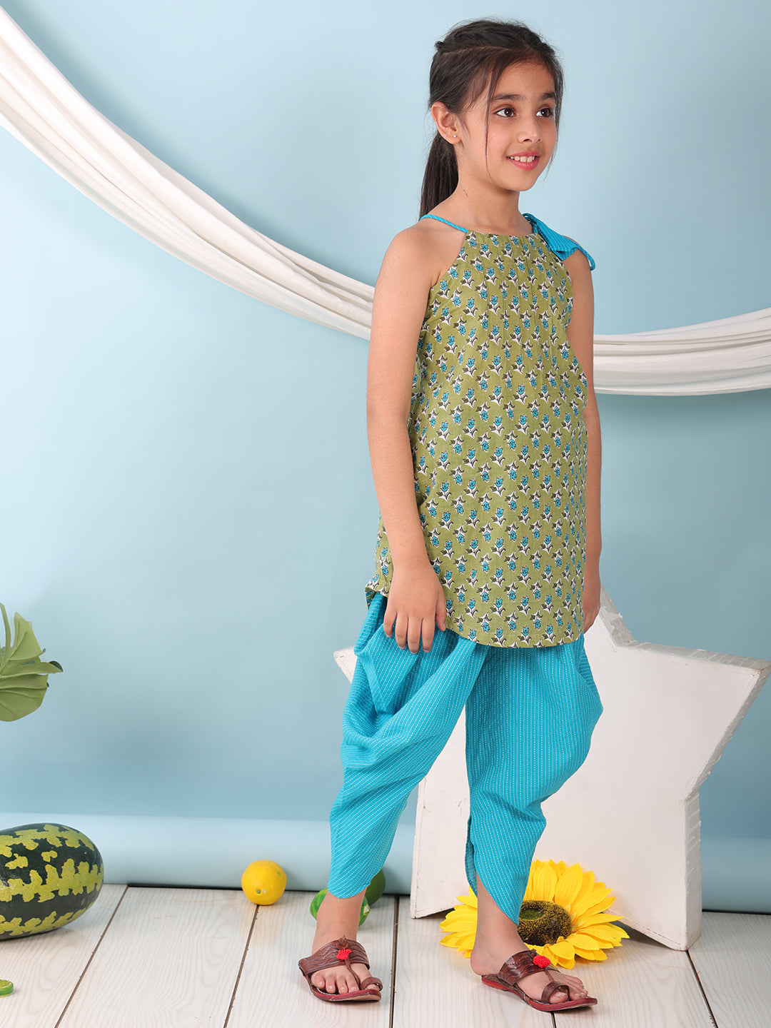Green floral sleeveless tie on Kurti with Blue Dhoti