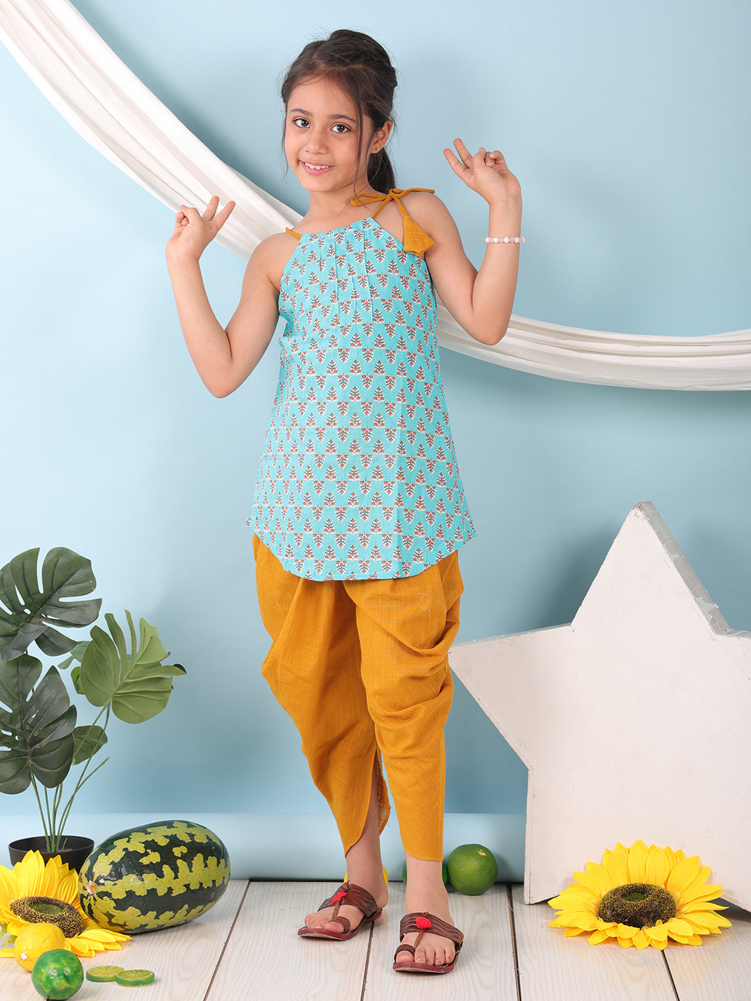 Blue floral sleeveless tie on Kurti with  Yellow Dhoti