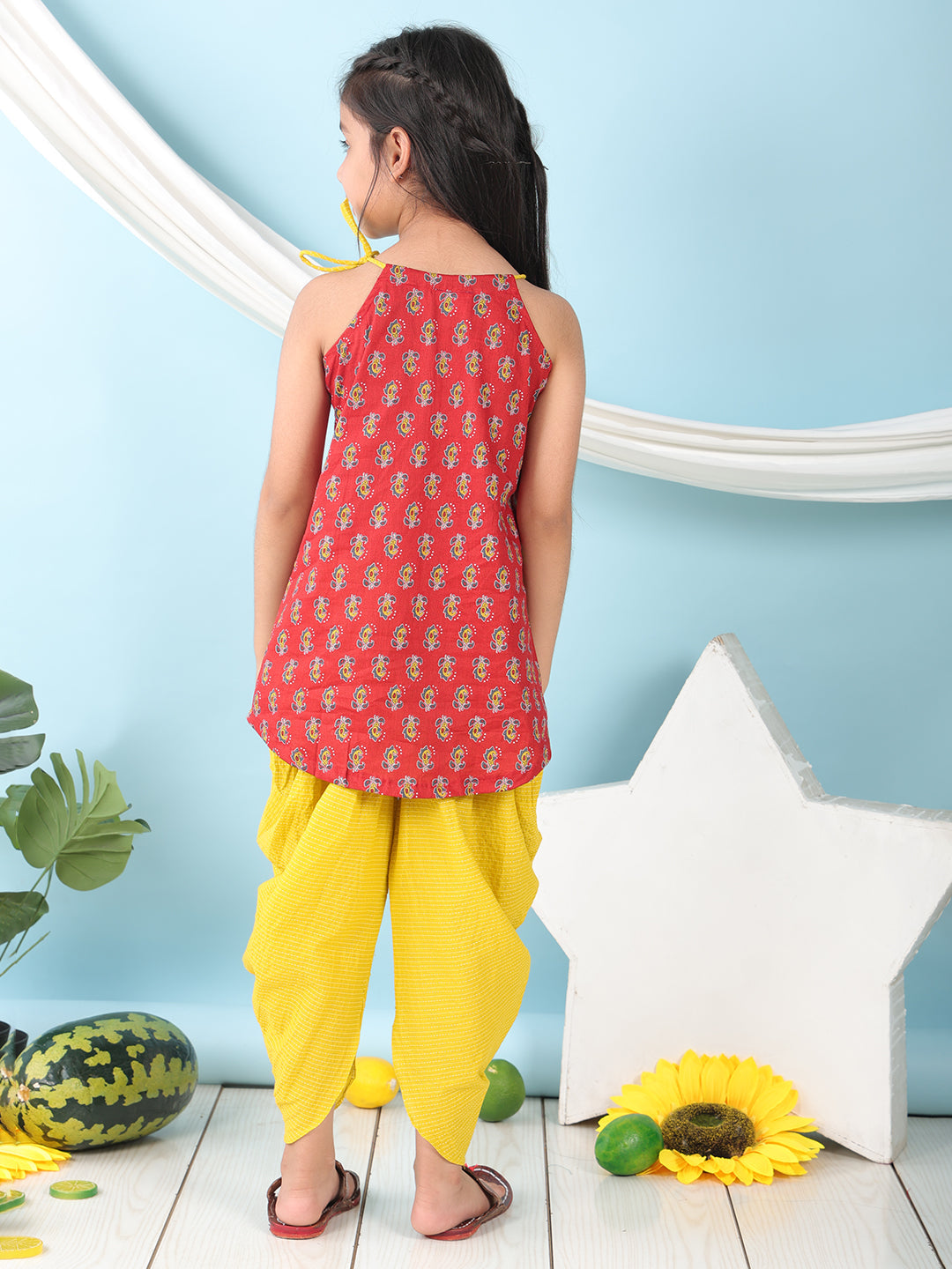 Red floral sleeveless tie on Kurti with Yellow Dhoti