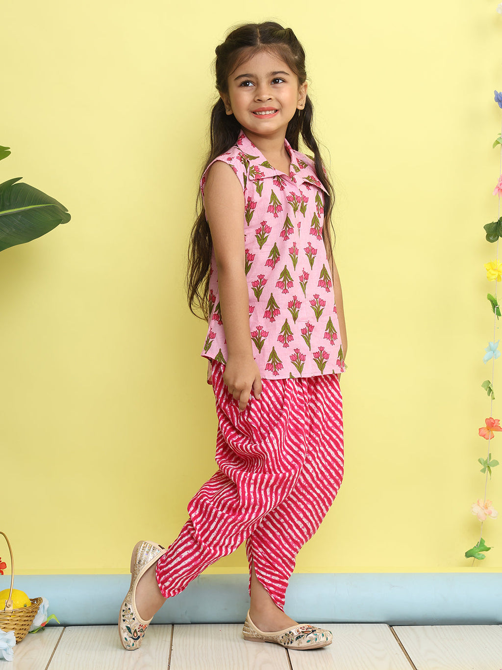 Pink Floral Printed sleeveless Kurti  paired with Pink lehriya Dhoti