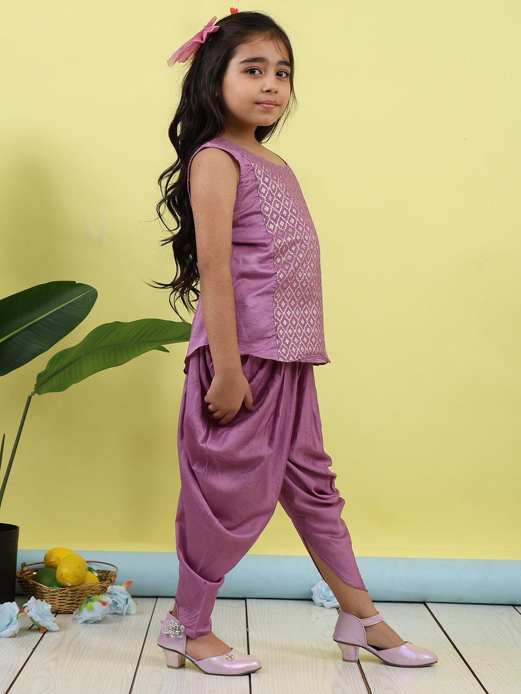 Purple Jaquard sleeveless kurti with purple dhoti pant