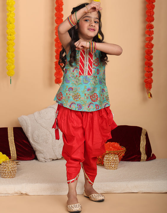 Green printed sleeveless kurti with Red dhoti