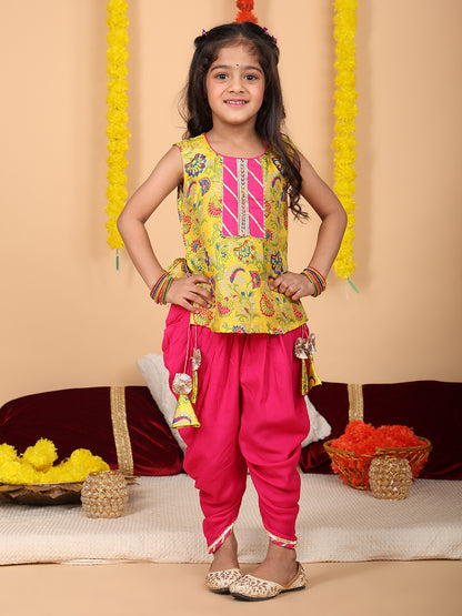 Yellow printed sleeveless kurti with Pink dhoti