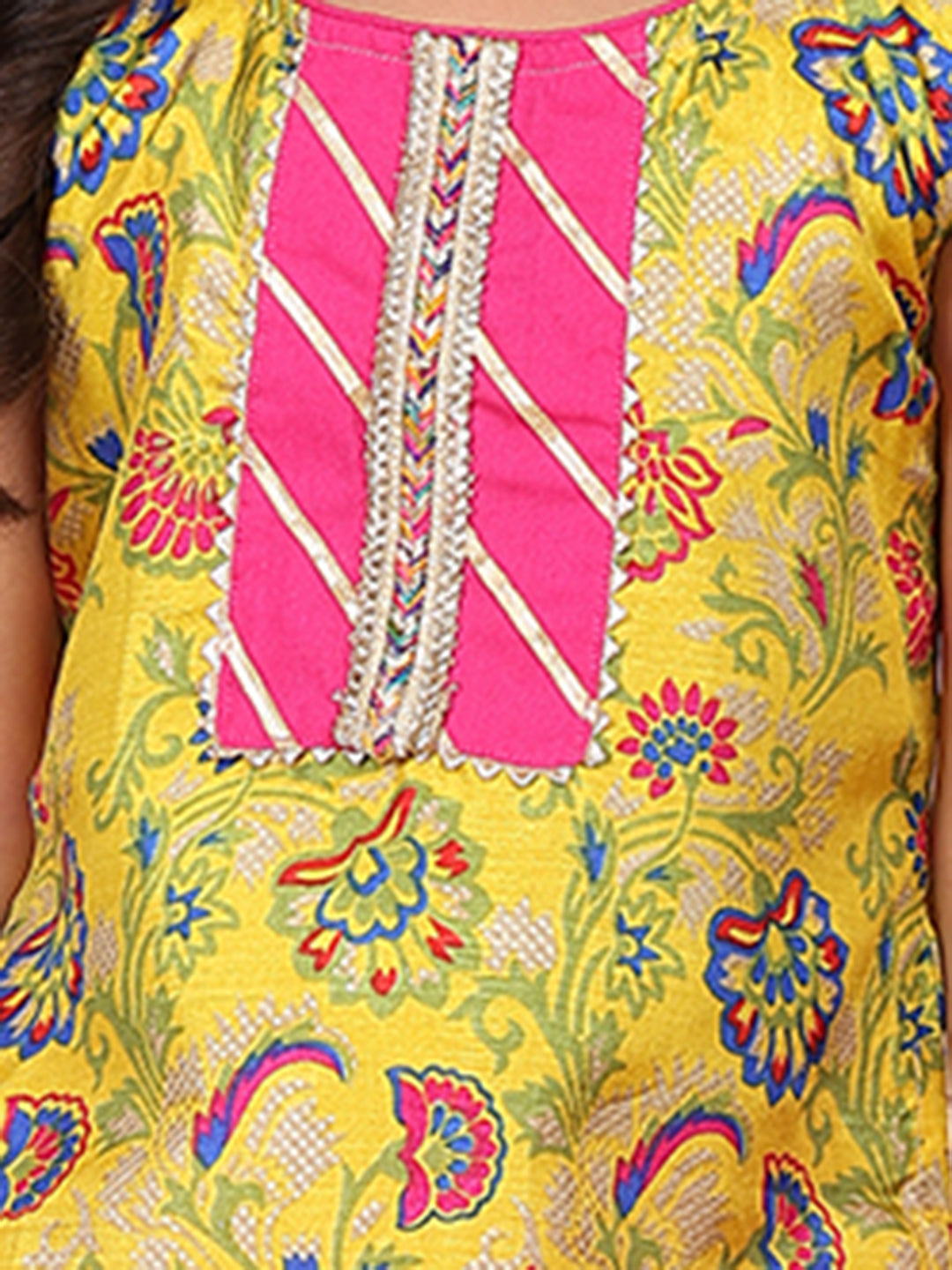 Yellow printed sleeveless kurti with Pink dhoti