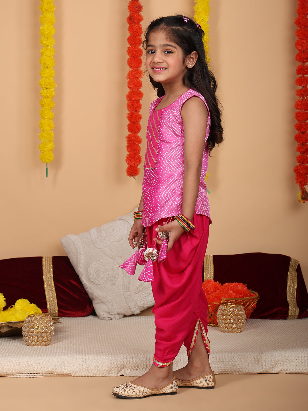 Pink printed sleeveless kurti with Pink dhoti