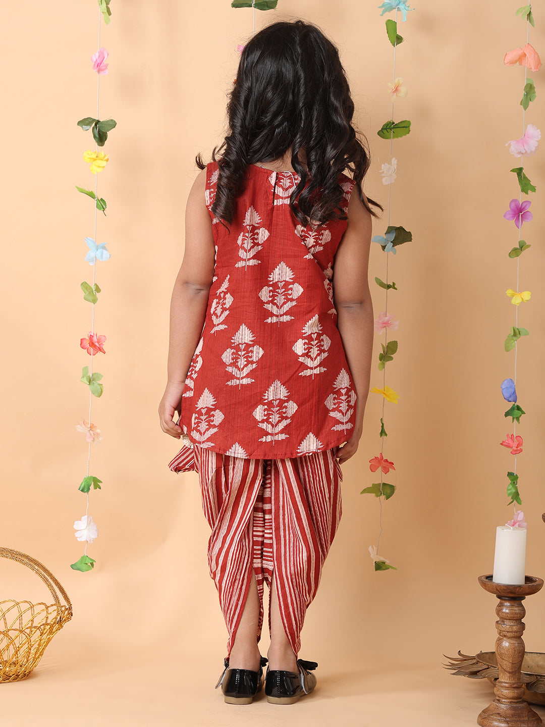 Red printed sleeveless kurti with Red dhoti