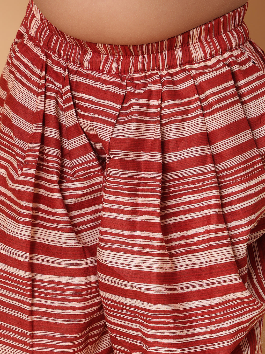Red printed sleeveless kurti with Red dhoti