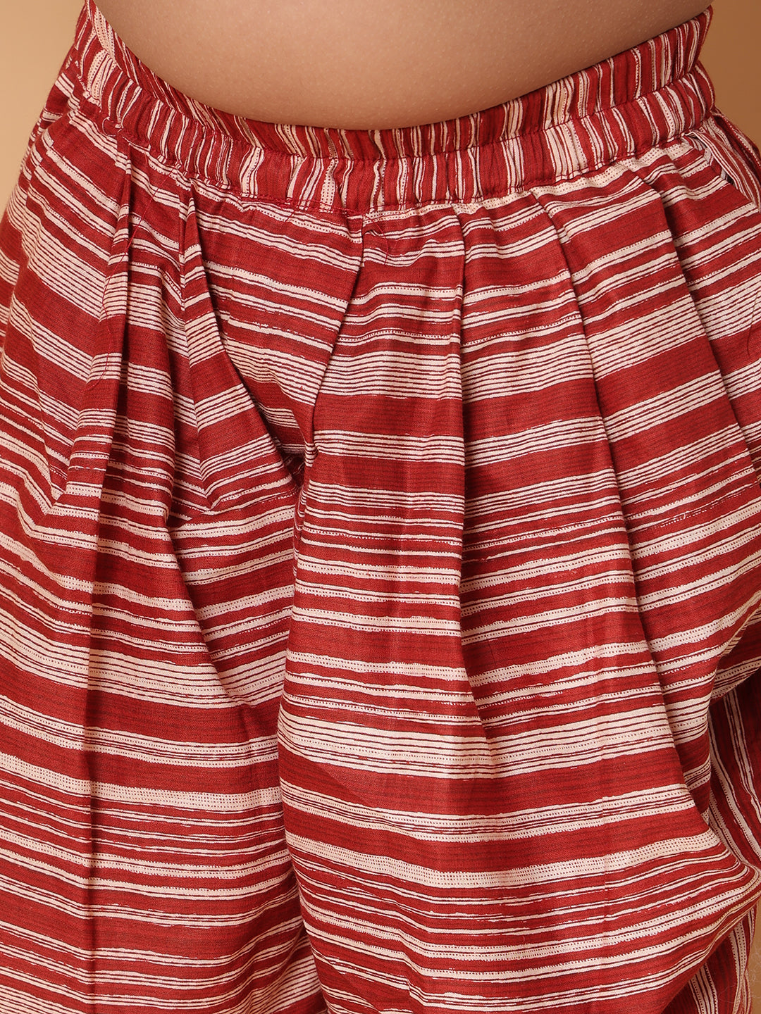 Red printed sleeveless kurti with Red dhoti