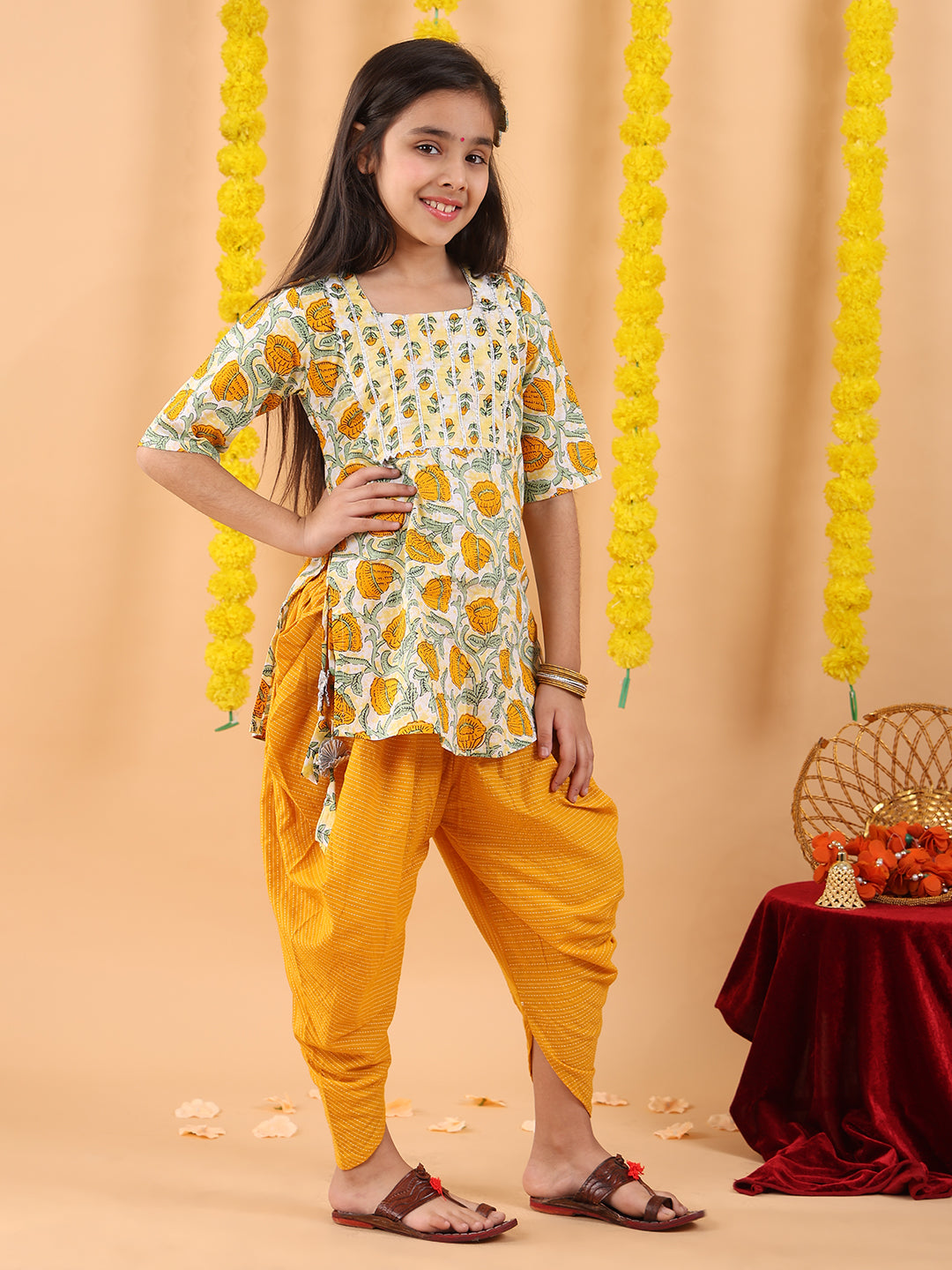 Yellow printed lace work kurti with Katha dhoti