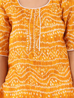 Yellow bandhani kurti with shibori dhoti