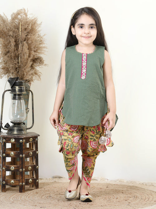 Yellow Floral printed dhoti paired with Green katha Kurti with a lace border at the neckline